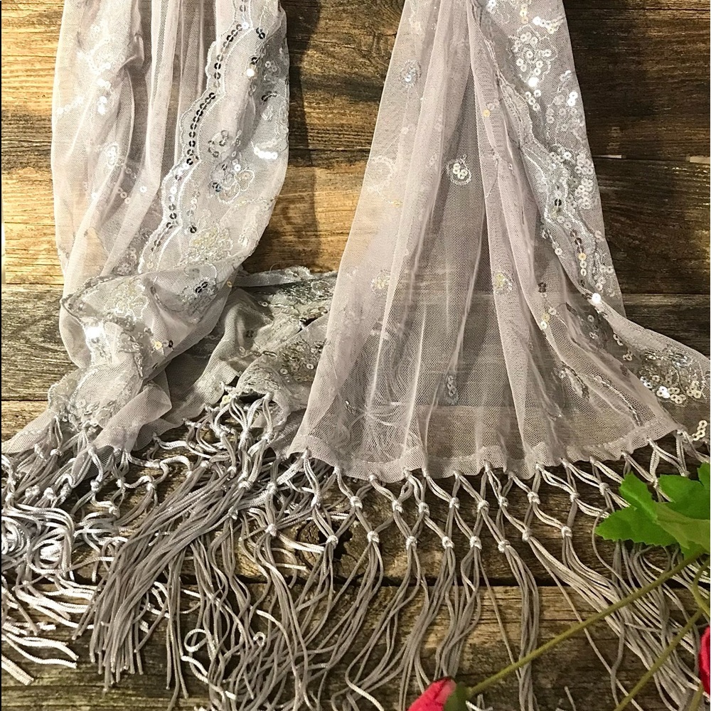 Grey Glittery Scarf delicate and fringed . As new never worn .